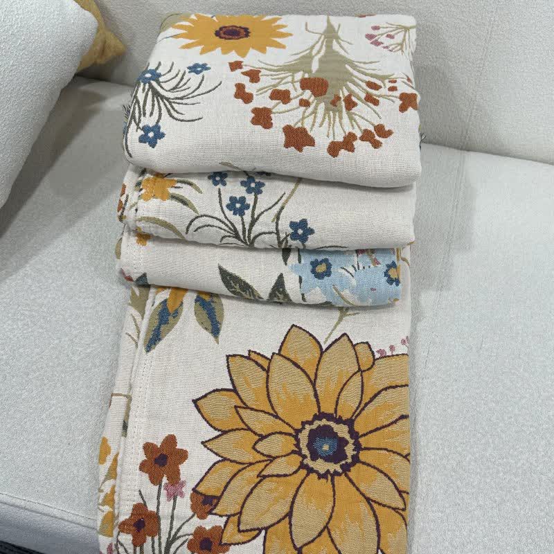 Trapunta reversibile in garza di cotone con motivo a girasole in fiore