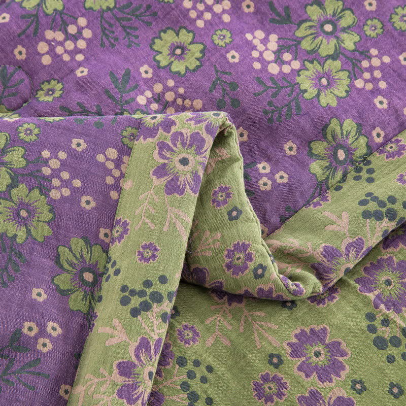 Trapunta jacquard in garza di cotone con motivo a fiori di prugna