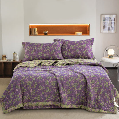 Trapunta jacquard in garza di cotone con motivo a fiori di prugna