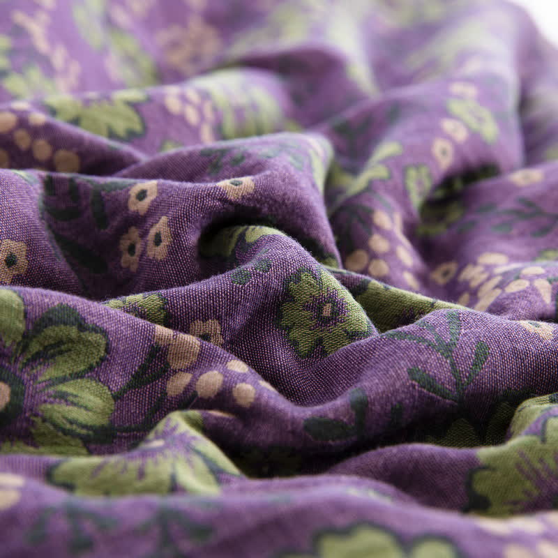 Trapunta jacquard in garza di cotone con motivo a fiori di prugna