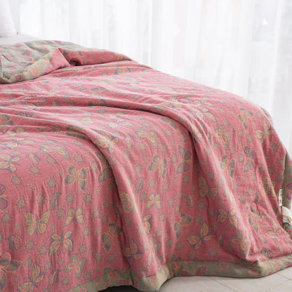 Trapunta jacquard in garza di cotone con farfalla rosa