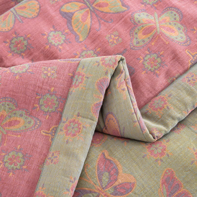 Trapunta jacquard in garza di cotone con farfalla rosa