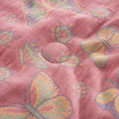 Trapunta jacquard in garza di cotone con farfalla rosa