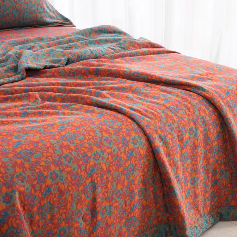 Trapunta jacquard in garza di cotone floreale arancione