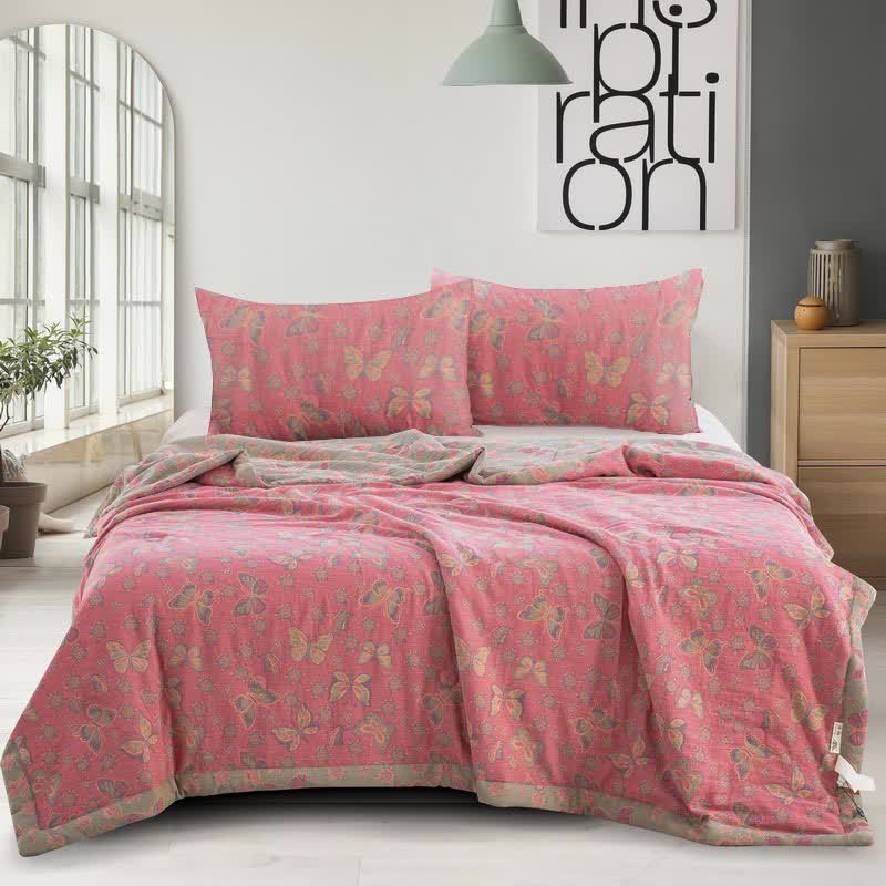Trapunta jacquard in garza di cotone con farfalla rosa