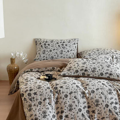 Set di biancheria da letto in cotone naturale floreale nero (4 pezzi)
