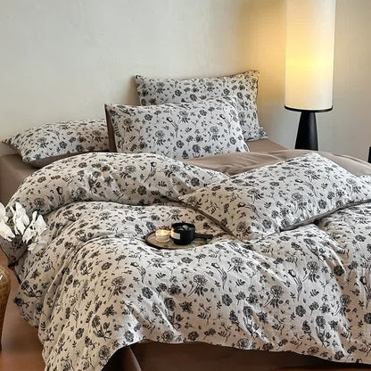 Set di biancheria da letto in cotone naturale floreale nero (4 pezzi)