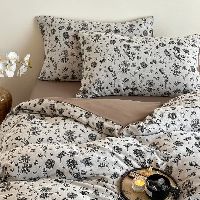 Set di biancheria da letto in cotone naturale floreale nero (4 pezzi)