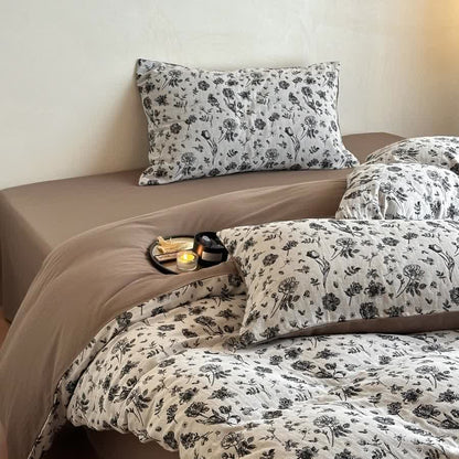 Set di biancheria da letto in cotone naturale floreale nero (4 pezzi)