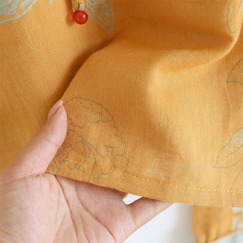 Pigiama in garza di cotone jacquard con farfalla e peonia - image 12