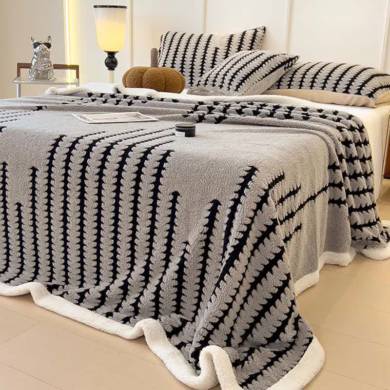 Coperta jacquard con stampa geometrica - image 3