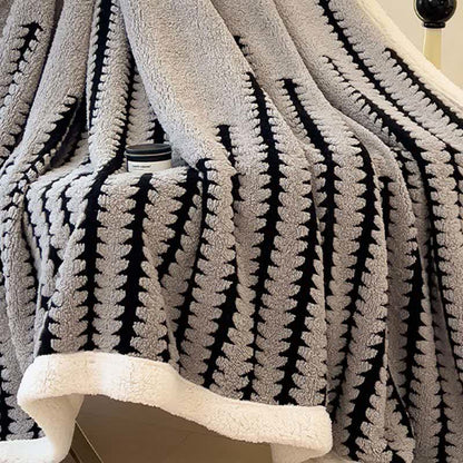 Coperta jacquard con stampa geometrica - image 11