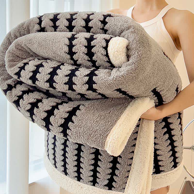 Coperta jacquard con stampa geometrica - image 7
