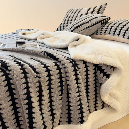 Coperta jacquard con stampa geometrica - image 6
