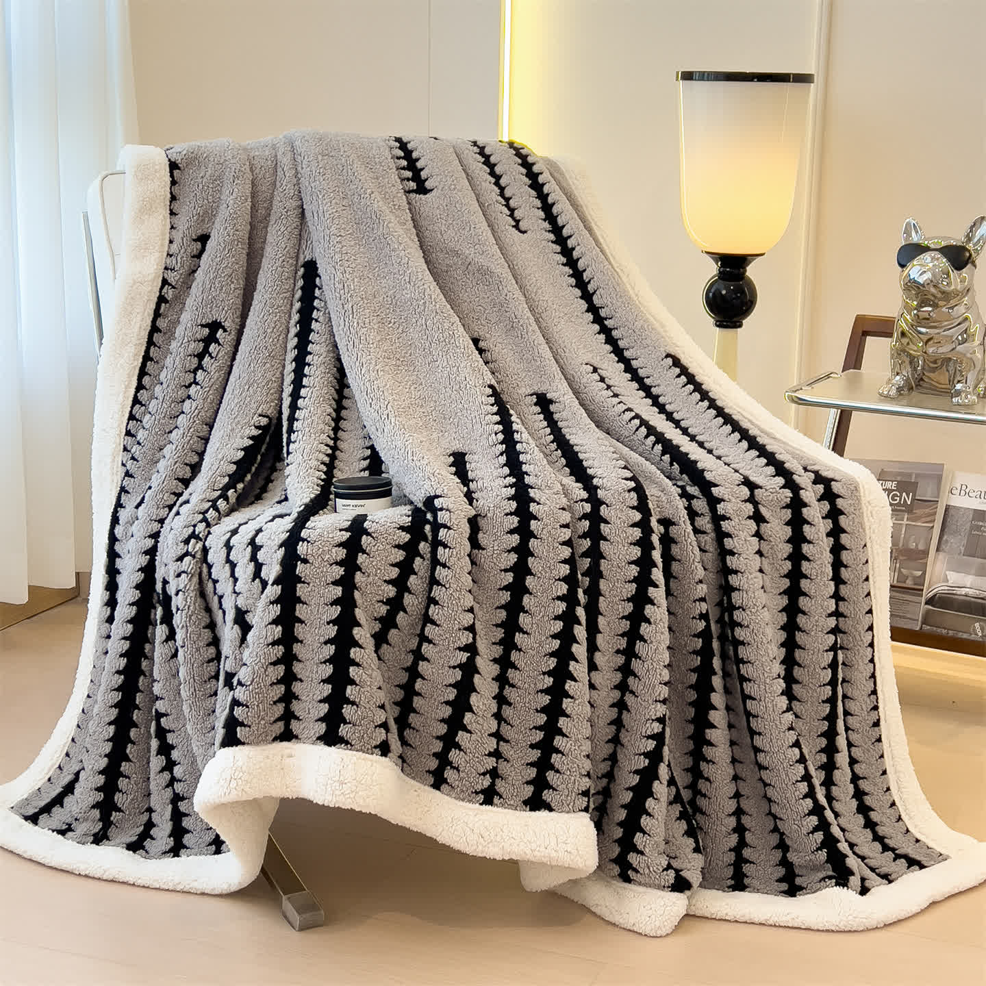 Coperta jacquard con stampa geometrica - image 10