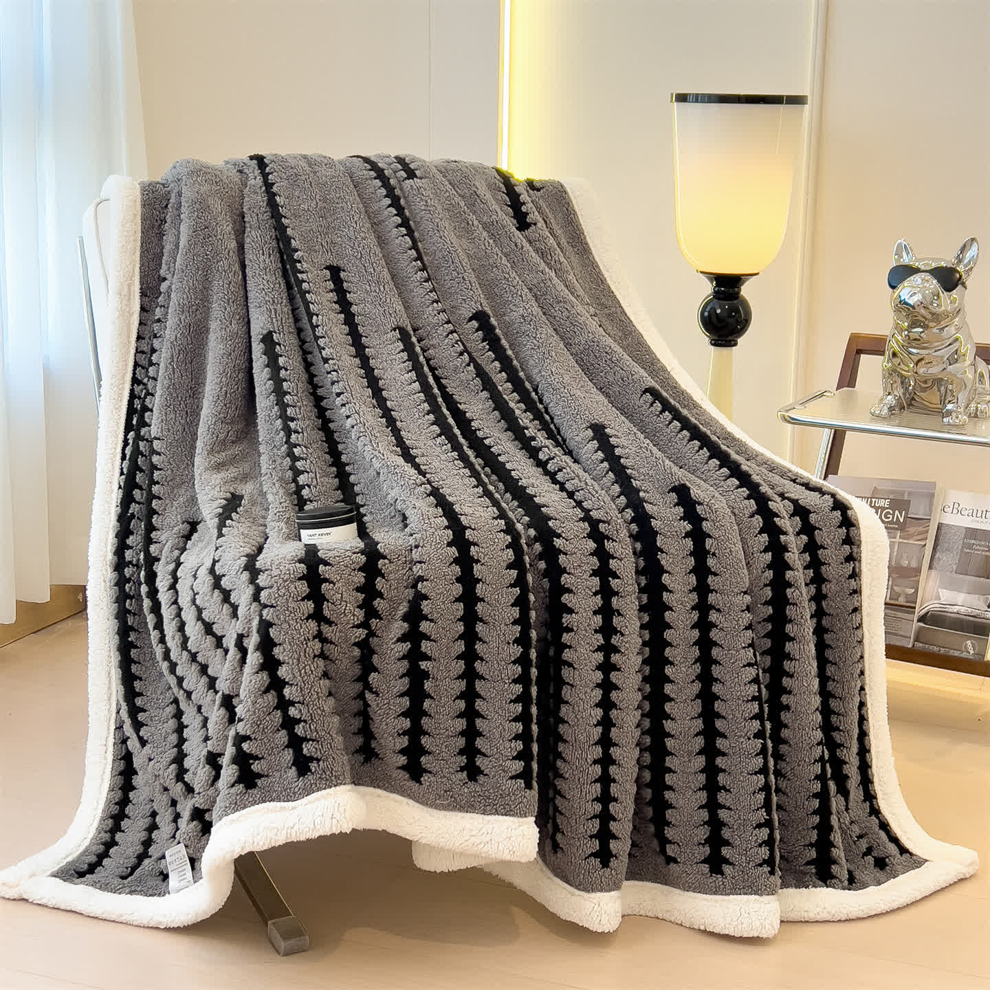 Coperta jacquard con stampa geometrica - image 13