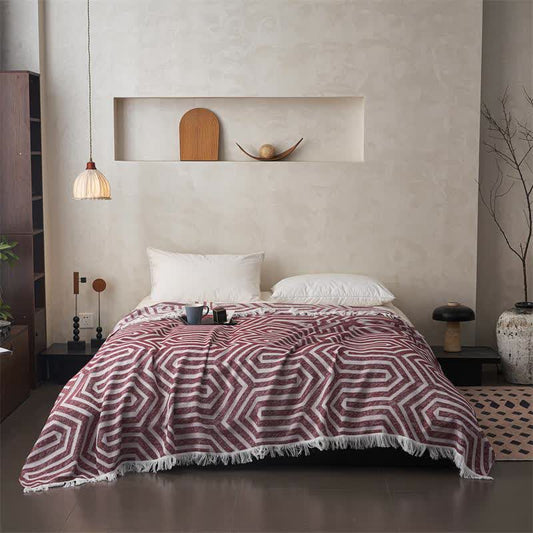 Trapunta reversibile in cotone jacquard a quadri con nappe - image 1