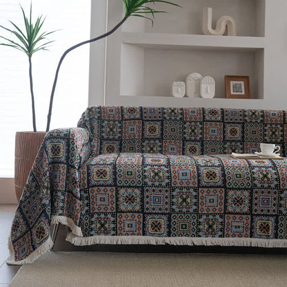 Coperta da divano con motivo geometrico a quadri - image 1
