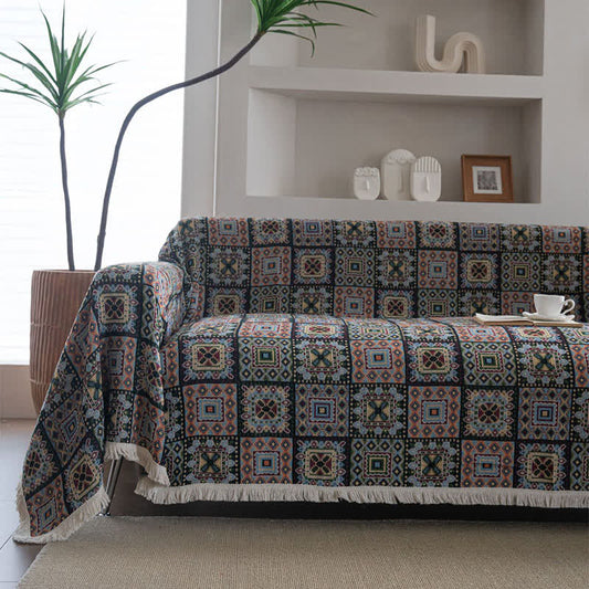Coperta da divano con motivo geometrico a quadri - image 1