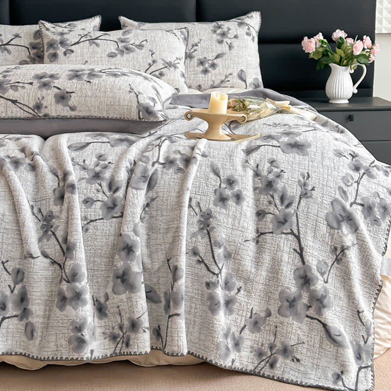 Coperta jacquard con motivo a fiori di prugna - image 1