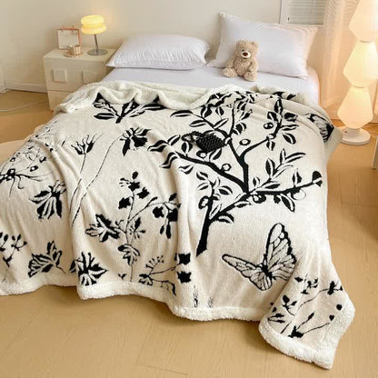 Coperta jacquard con motivo a farfalla e albero - image 2