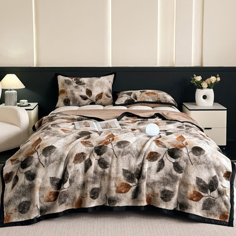 Coperta reversibile con stampa a foglie - image 1