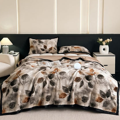 Coperta reversibile con stampa a foglie - image 1