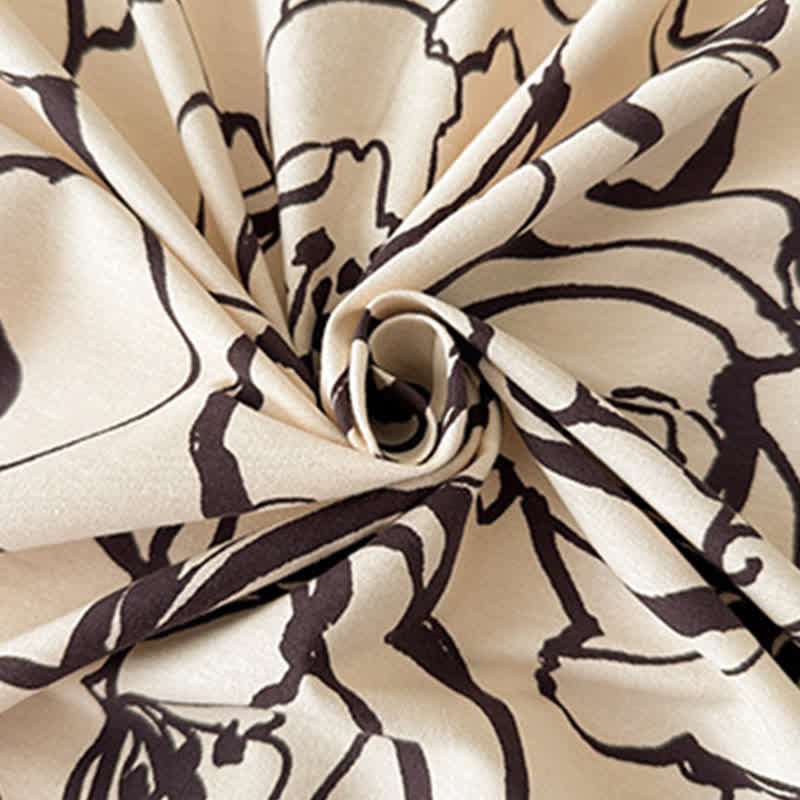 Copriletto in cotone spazzolato con motivo floreale astratto - image 2