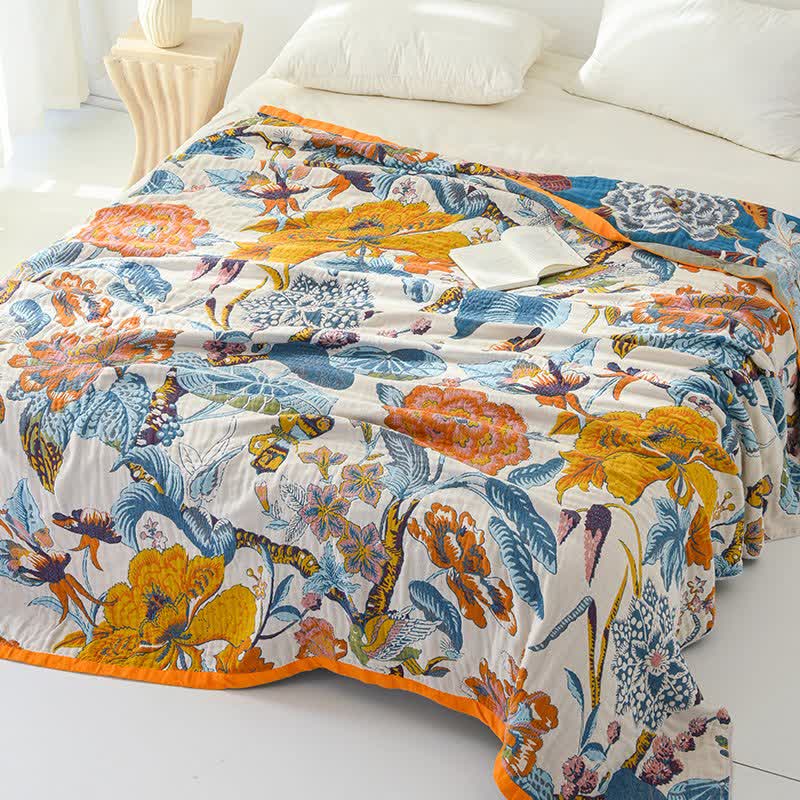 Trapunta reversibile in garza di cotone con motivo floreale rigoglioso - image 1