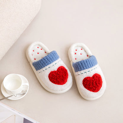 Pantofole di peluche con motivo a cuore - image 3