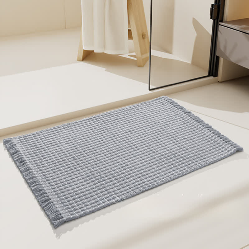 Tappetino da bagno intrecciato con nappe - image 3