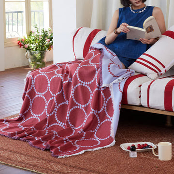 Coperta reversibile con motivo a cerchi e nappe - Rosso - 130cm x 130cm - image 0