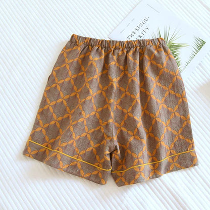 Pantaloncini del pigiama in garza di cotone a quadri gialli - image 1