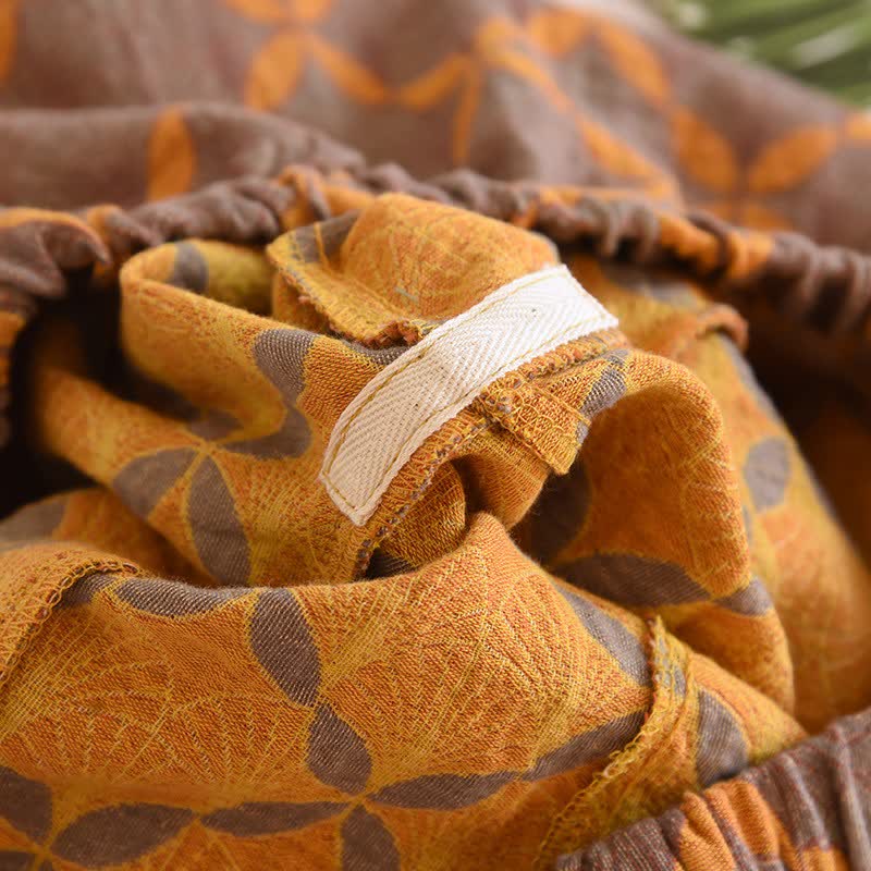 Pantaloncini del pigiama in garza di cotone a quadri gialli - image 8
