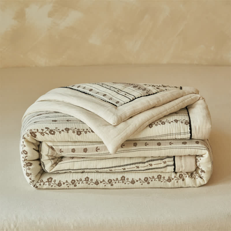 Trapunta a righe con motivo floreale in cotone e lino - image 1