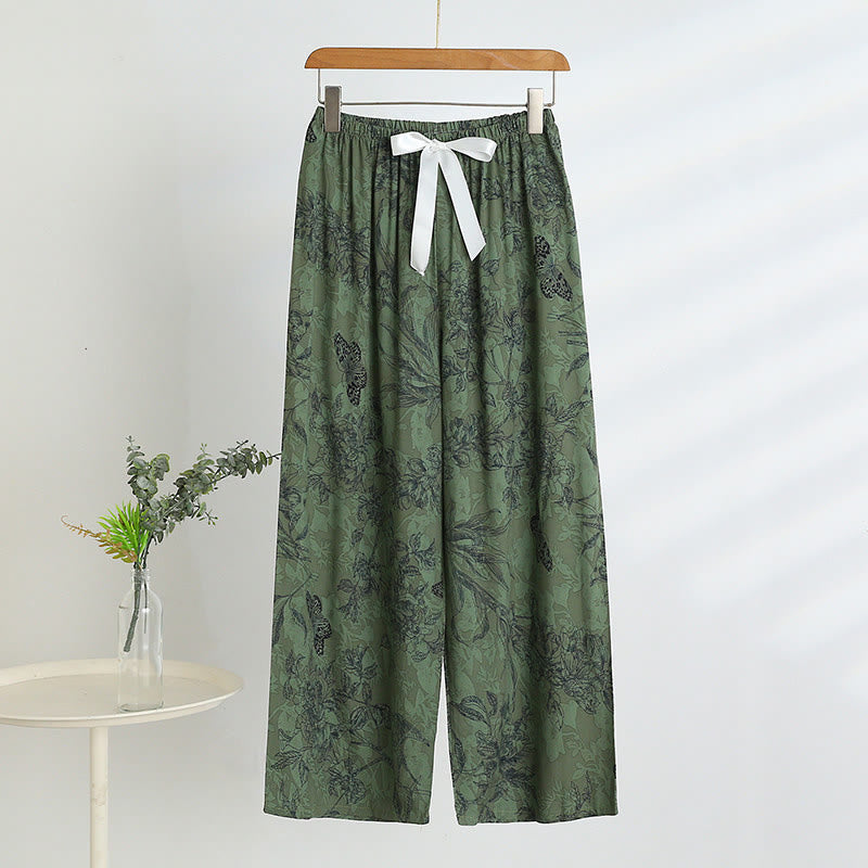 Pigiama composto da canotta e pantaloni con motivo a farfalle botaniche verdi - image 4