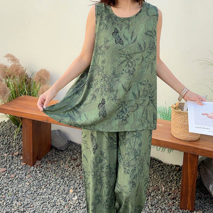 Pigiama composto da canotta e pantaloni con motivo a farfalle botaniche verdi - image 1