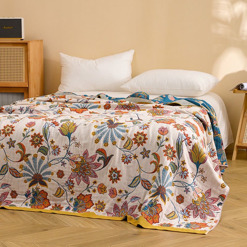 Trapunta reversibile in garza di cotone con motivo floreale - image 1