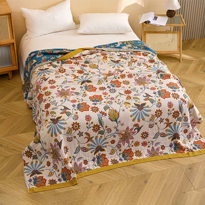Trapunta reversibile in garza di cotone con motivo floreale - image 2