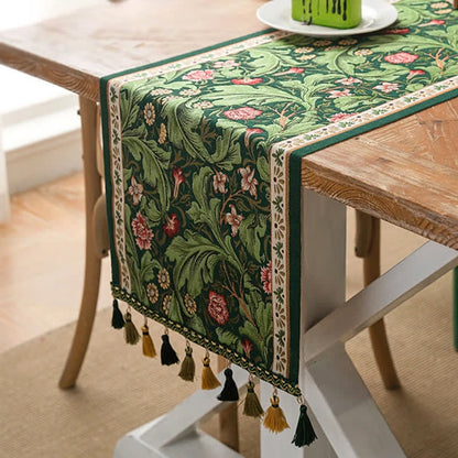 Runner da tavola con nappe jacquard a motivo di foglie tropicali - image 1