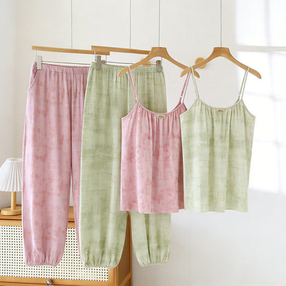 Completo da notte composto da canotta e pantaloni in cotone con stampe artistiche ispirate all'acquerello. - image 0