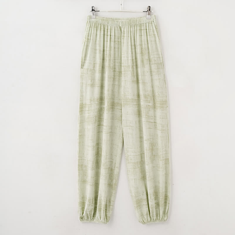 Completo da notte composto da canotta e pantaloni in cotone con stampe artistiche ispirate all'acquerello. - image 14