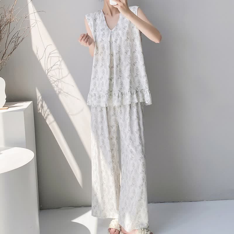 Elegante pigiama composto da canotta e pantaloni con stampa a foglie. - image 1