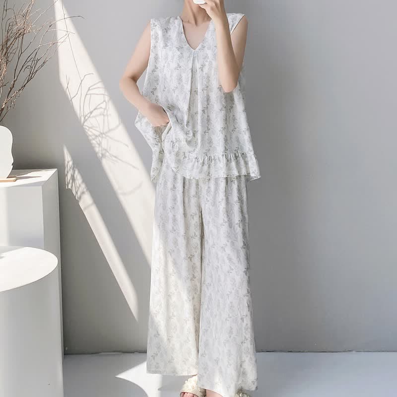 Elegante pigiama composto da canotta e pantaloni con stampa a foglie. - image 2