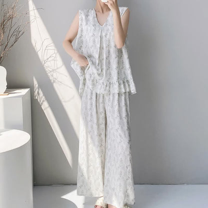 Elegante pigiama composto da canotta e pantaloni con stampa a foglie. - image 2