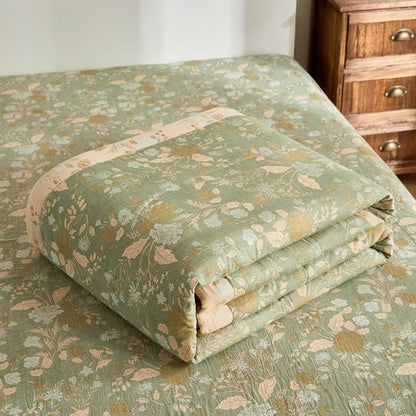 Trapunta jacquard con motivo floreale a foglie in garza di cotone - image 6