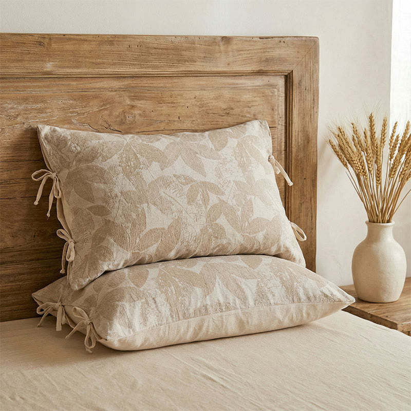 Federe jacquard con motivo a foglie botaniche (2 pezzi) - image 1