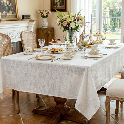 Tovaglia jacquard con motivo a foglie - image 1