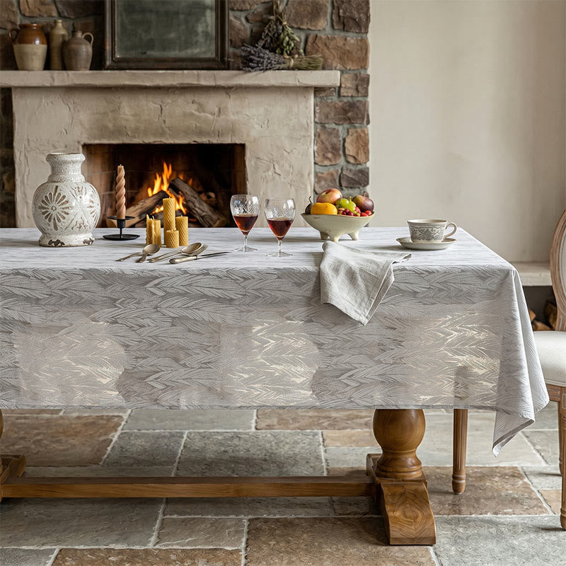 Tovaglia jacquard con motivo a foglie - image 6