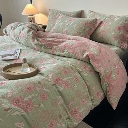 Set di 4 pezzi di biancheria da letto in garza di puro cotone con motivo floreale e farfalle. - image 1